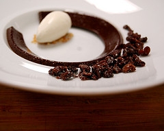 Pliable Ganache: Bruleed and Presented with Popcorn Ice Cream and Cumin Pecans. Pastry Chef: Plinio Sandalio