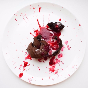 Two Pet Peeves For The Price of One: the obligatory chocolate cake garnished with a splatter of blood-red fruit sauce